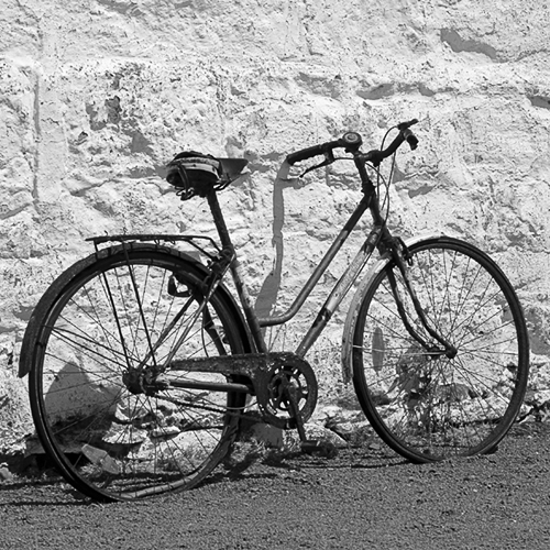 bicycle and white wall